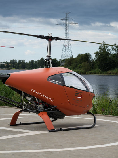 HungaroCopter HC-02 helicopter by the lake at the HeliBaltic base